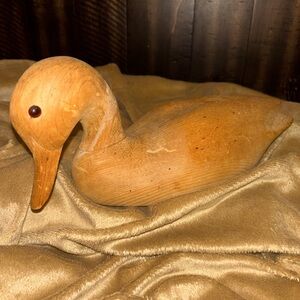 Vintage Wooden Duck Decoy with glass eyes.